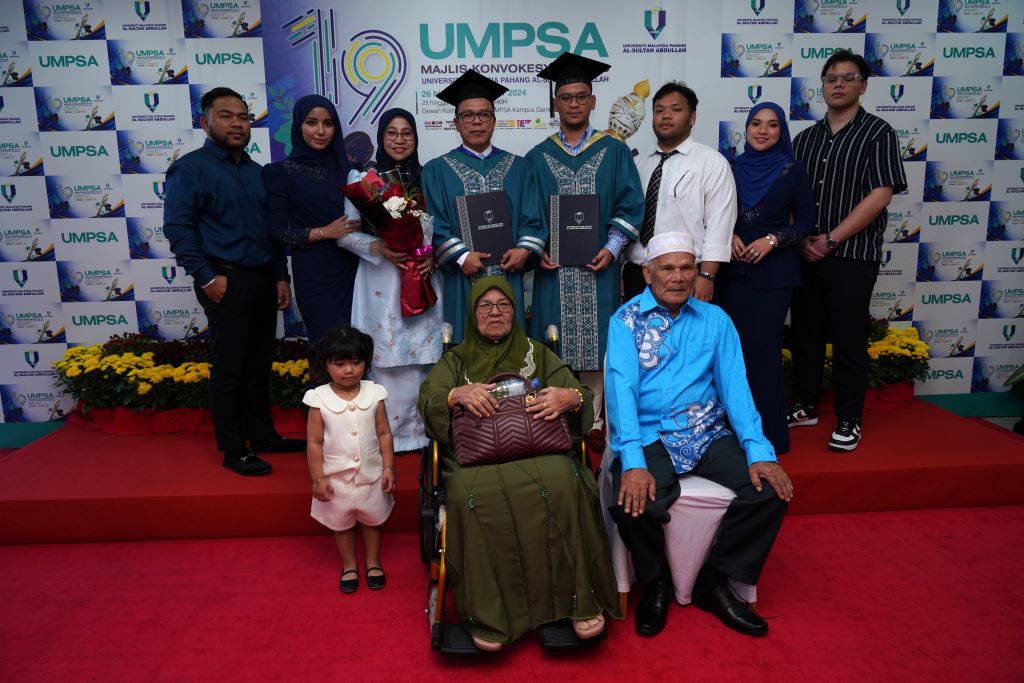 Father and son share convocation stage