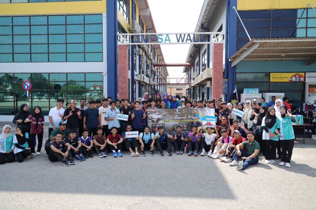 Engines roar at UMPSA as over 120 luxury and antique vehicles roll in