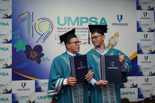 Father and son share convocation stage