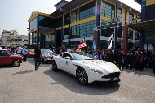 Engines roar at UMPSA as over 120 luxury and antique vehicles roll in