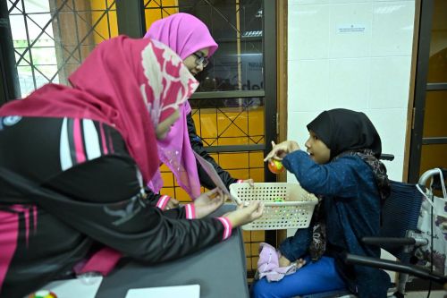 Pendekatan bermain sambil belajar menjadi antara aktiviti utama ECoRehaB 2.0 bagi membantu merangsang kemahiran motor dan interaksi kanak-kanak OKU.